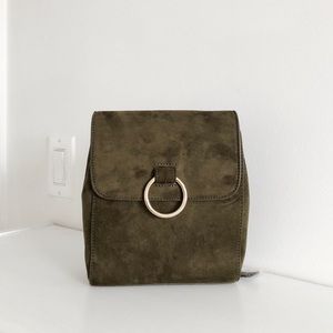 Dark green suede mini backpack